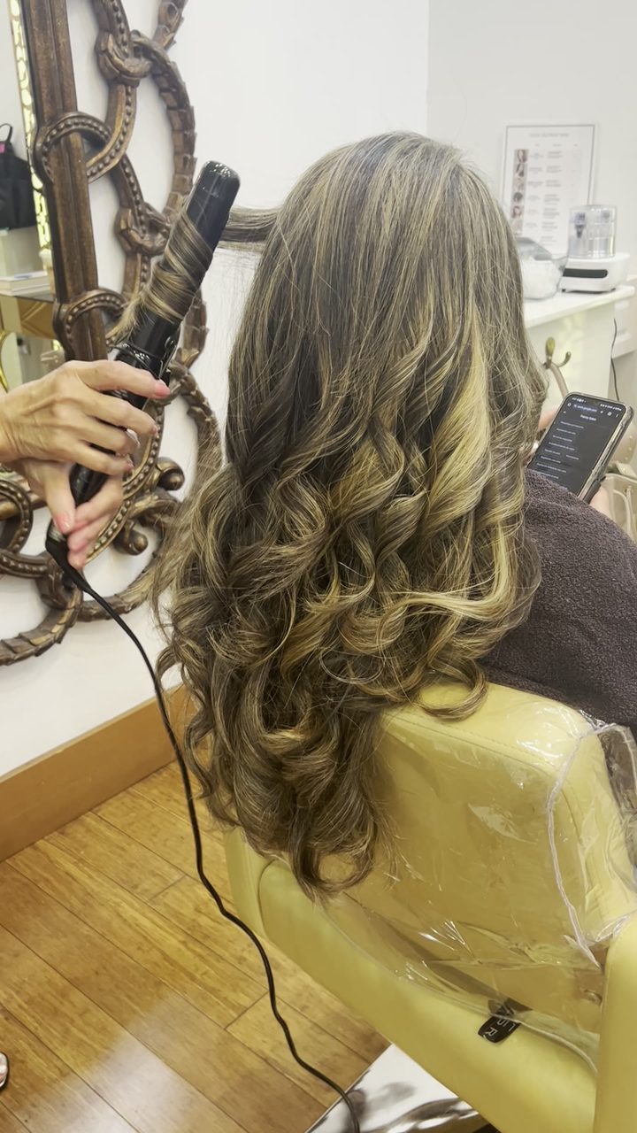 Balayage being applied by hand