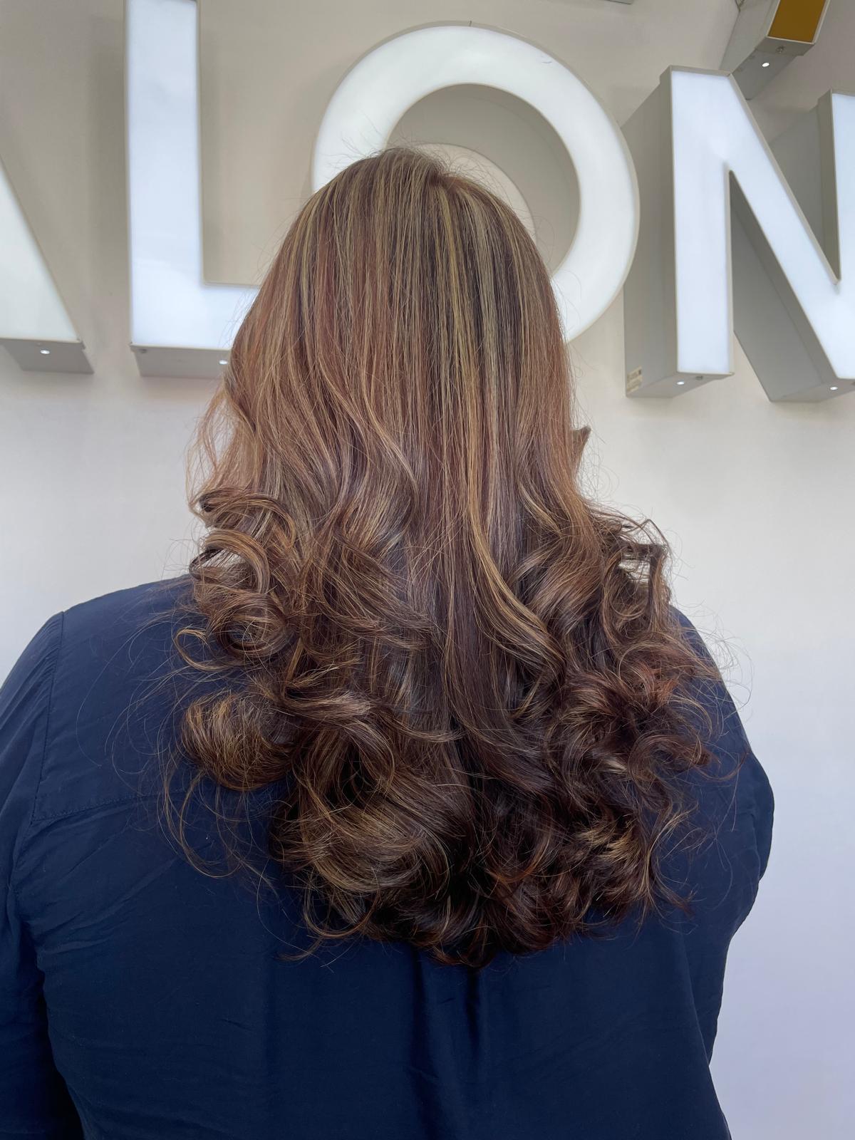 Glossy highlighted brown waves in the Frenzy Salon studio